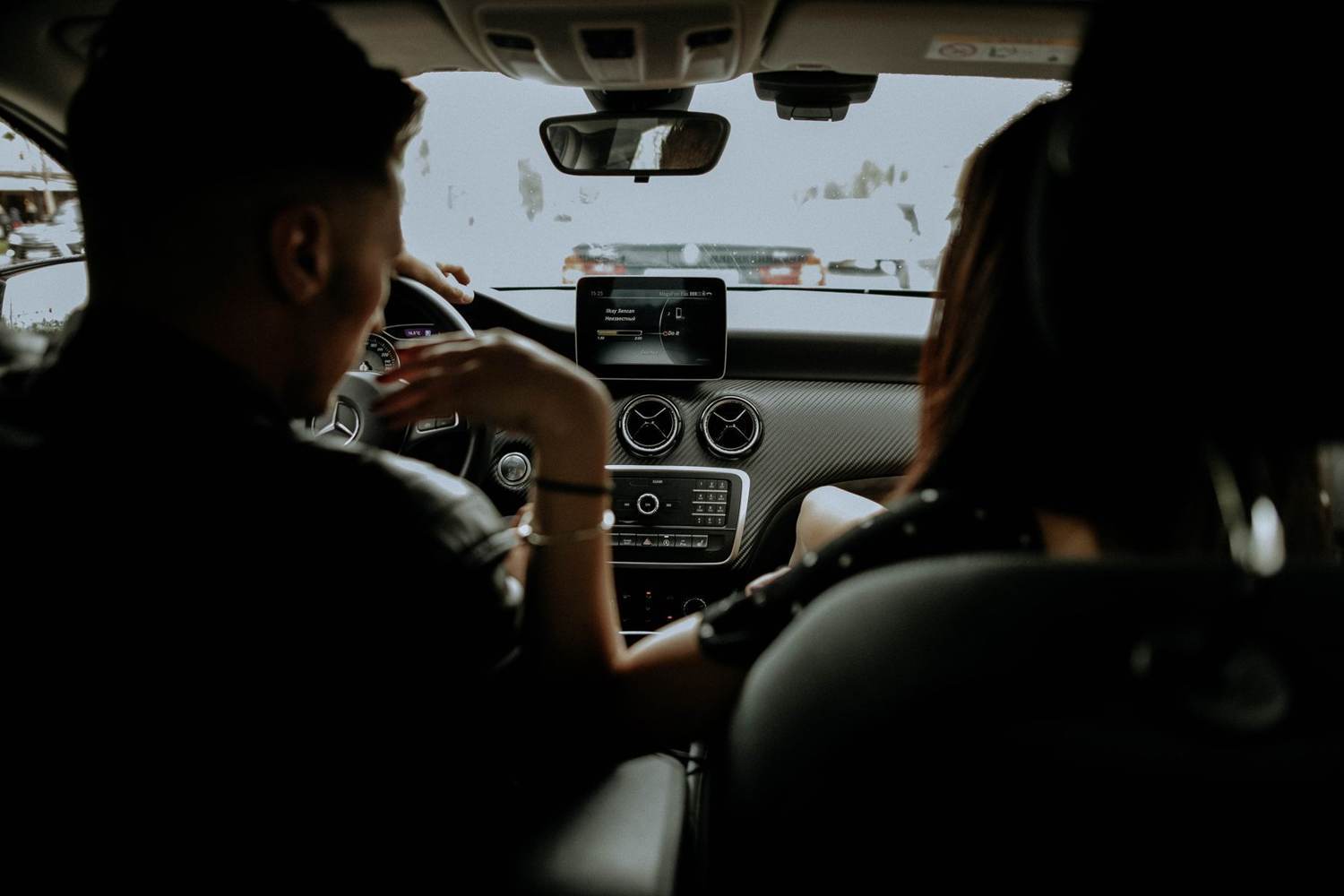 Two people riding in a car